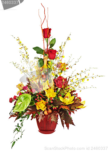 Image of Colorful flower bouquet arrangement centerpiece in vase isolated