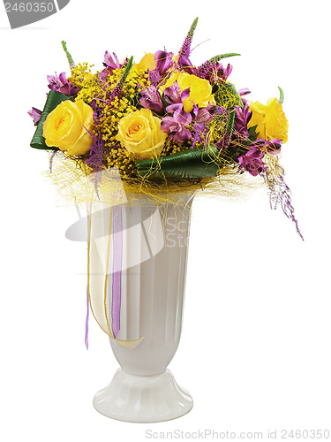 Image of Floral bouquet of yellow roses and orchids arrangement centerpie