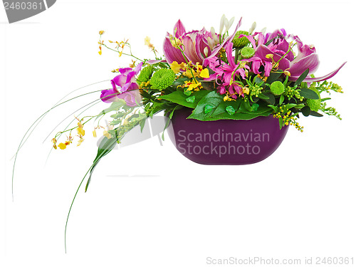 Image of Colorful flower bouquet arrangement centerpiece in vase isolated