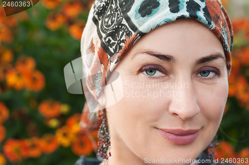 Image of Portrait of fine woman looking up.