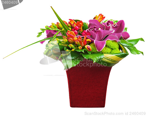 Image of Colorful flower bouquet arrangement centerpiece in vase isolated