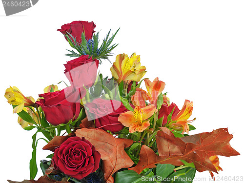 Image of Fragment of bouquet of roses and lilies arrangement centerpiece 