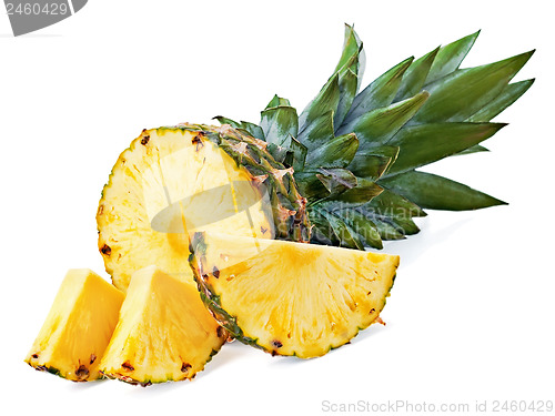 Image of ripe pineapple with slices  isolated on white background