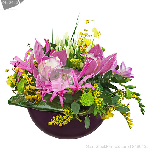 Image of Colorful flower bouquet arrangement centerpiece in vase isolated