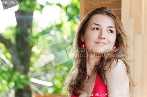 Image of Outdoor fashion portrait of young girl.