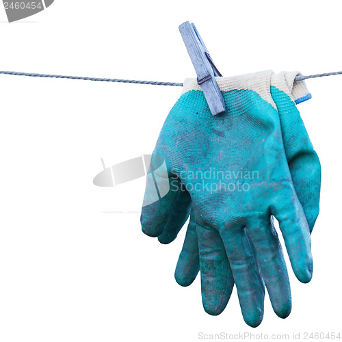 Image of Old gardening gloves isolated on white background.