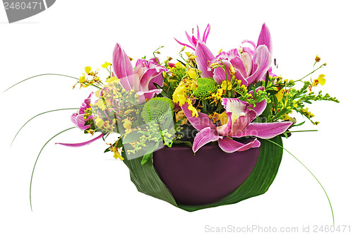 Image of Bouquet from orchids and lilies in vase isolated on white backgr