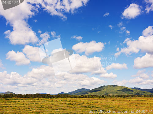 Image of Landscape with mountain views, arable land, blue sky and beautif
