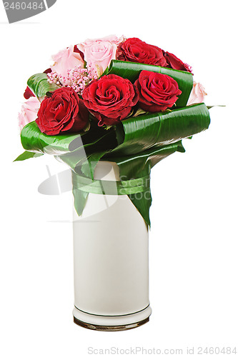 Image of Colorful flower bouquet from roses in white vase isolated on whi