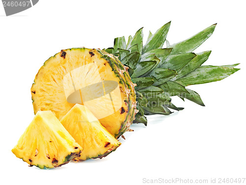 Image of ripe pineapple with slices  isolated on white background