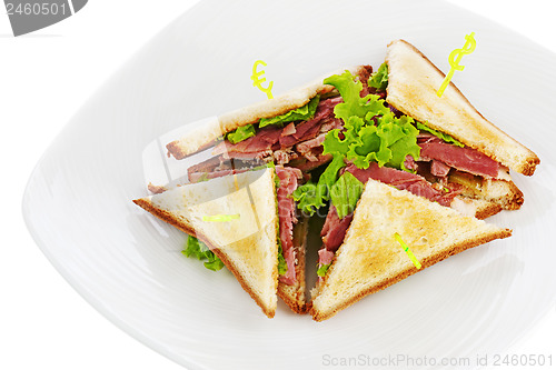 Image of Sandwiches with  chicken, bacon and vegetables isolated on white