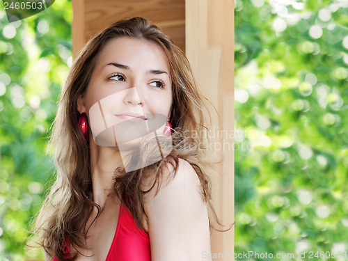 Image of Outdoor fashion portrait of young girl.