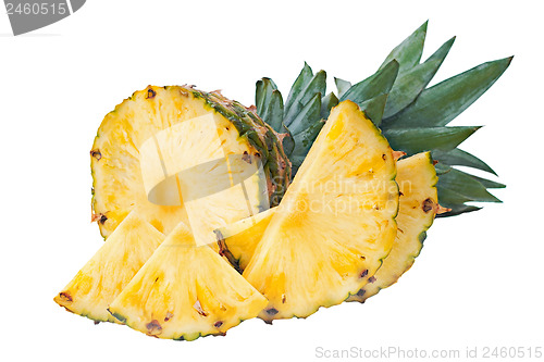 Image of ripe pineapple with slices  isolated on white background