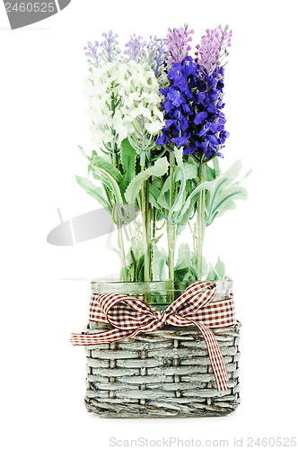 Image of Composition of artificial garden flowers in decorative vase isol