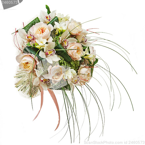 Image of Flower arrangement of peon flowers and orchids isolated on white