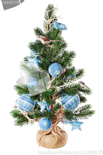 Image of Christmas fir tree decorated with toys and Christmas decorations