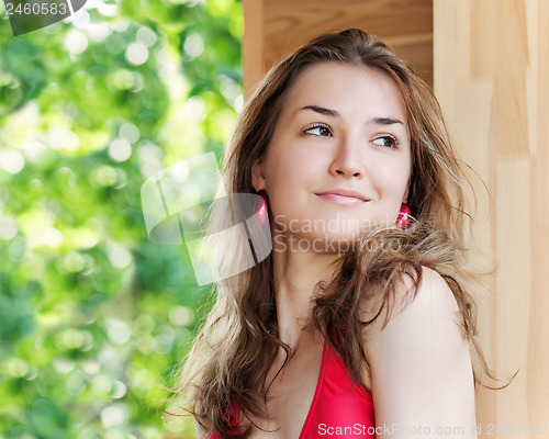 Image of Outdoor fashion portrait of young girl.