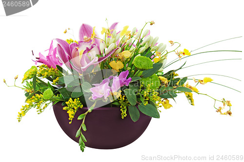 Image of Bouquet from orchids and lilies in vase isolated on white backgr