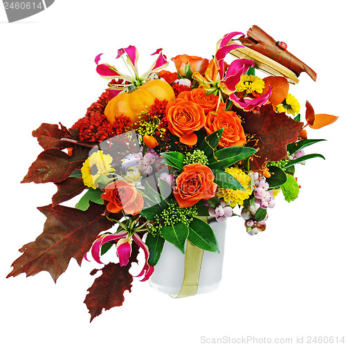 Image of Autumn arrangement of flowers, vegetables and fruits isolated on