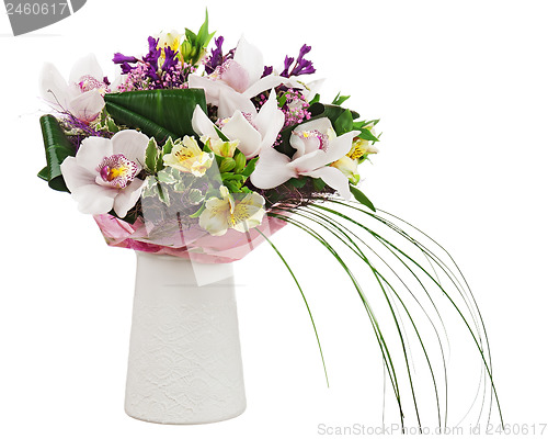 Image of Bouquet from orchids in white vase isolated on white background.