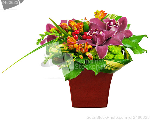 Image of Flower bouquet arrangement centerpiece in vase isolated on white