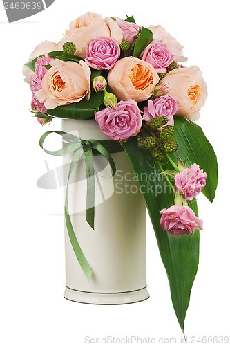 Image of Colorful flower bouquet from roses and peon flowers in vase isol