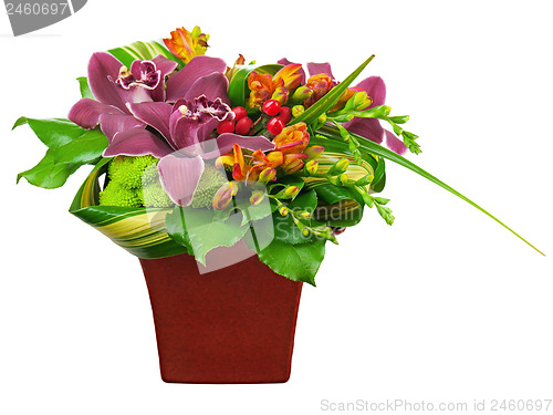 Image of Flower bouquet arrangement centerpiece in vase isolated on white