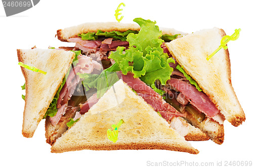 Image of Sandwiches with  chicken, bacon and vegetables isolated on white