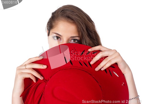 Image of young beautiful woman with red hat