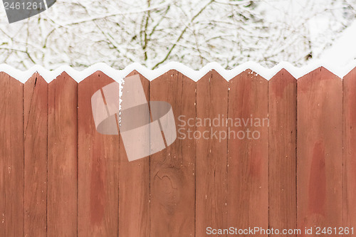 Image of Old Wooden Fence In A Snow