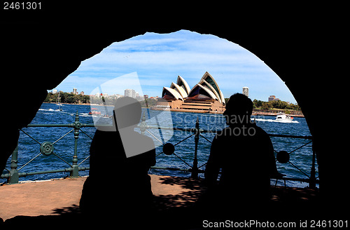 Image of Silhouette of man and woman enjoying Sydney Harbour and Opera Ho