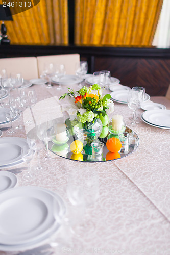 Image of tables decorated with flowers