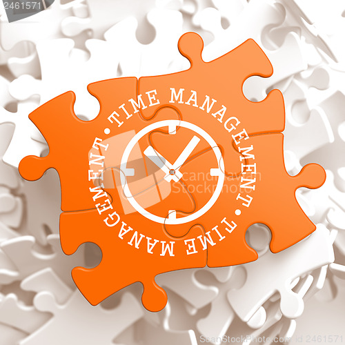 Image of Time Management Concept on Orange Puzzle Pieces.