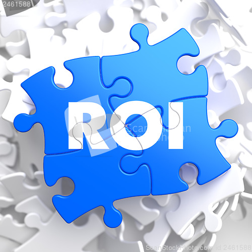 Image of ROI on Blue Puzzle Pieces. Business Concept.