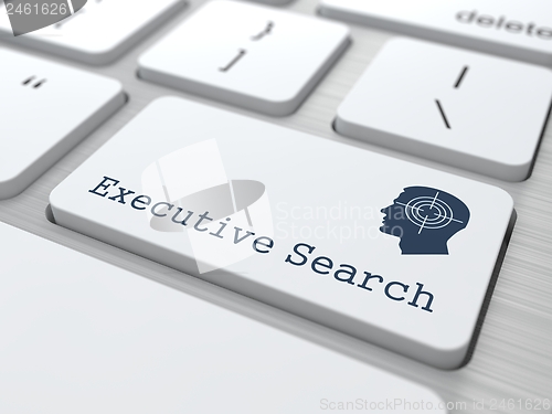 Image of White Keyboard with Executive Search Button.