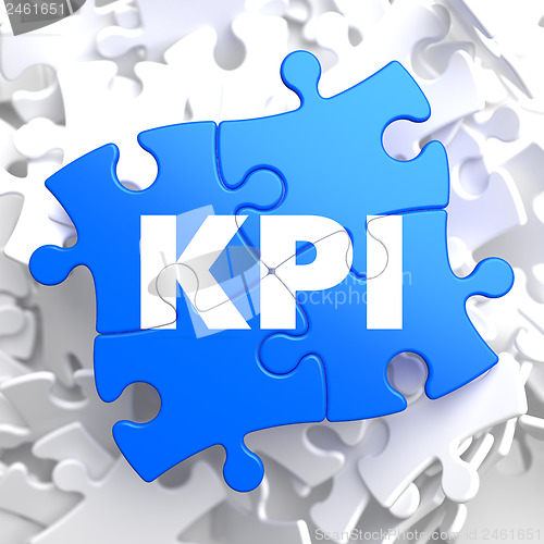 Image of KPI on Blue Puzzle Pieces. Business Concept.