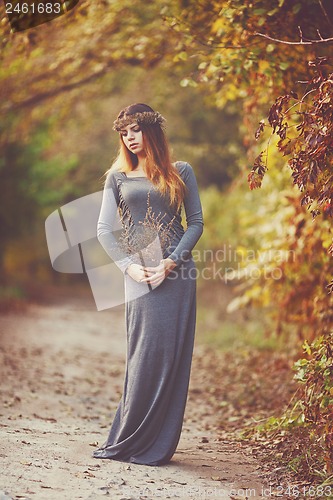 Image of Beautiful Girl in the autumn park