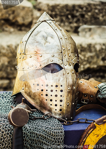 Image of Protective helmet with a visor on medieval knight 