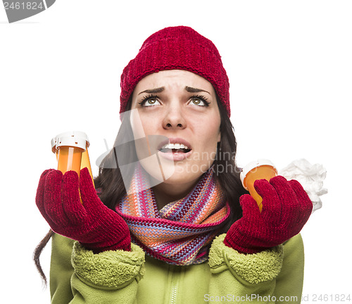 Image of Sick Mixed Race Woman with Empty Medicine Bottles and Tissue 
