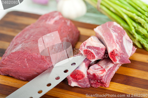 Image of raw beef and pork ribs