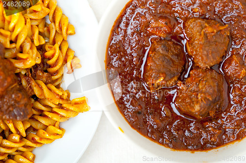 Image of fusilli pasta with neapolitan style ragu meat sauce