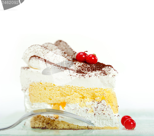 Image of whipped cream and ribes dessert cake slice