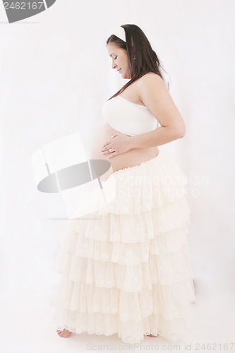 Image of Happy young pregnant woman 