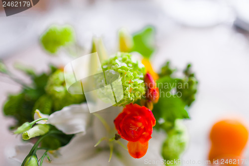 Image of decoration with flowers and fruit
