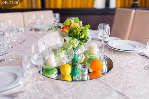 Image of tables decorated with flowers