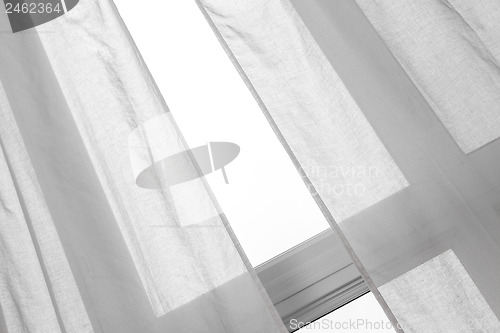 Image of Window with white curtains