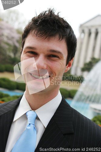 Image of Cheerful businessman