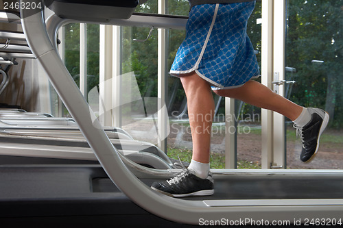 Image of Low section of man on treadmill