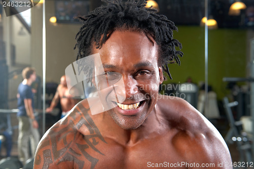 Image of Portrait of man exercising in gym