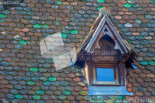 Image of old roof wth window